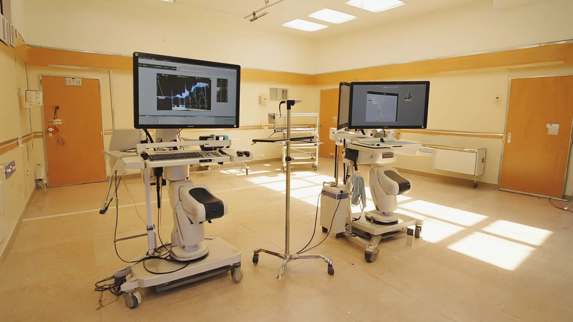 People-free clinical still life with a knee model, imaging and orthopaedic equipment illustrating CORI vs Mako: How Robotic Knee Replacement Systems Compare