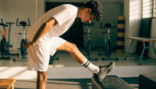 Single athlete completing independent rehabilitation during recovery after ACL reconstruction